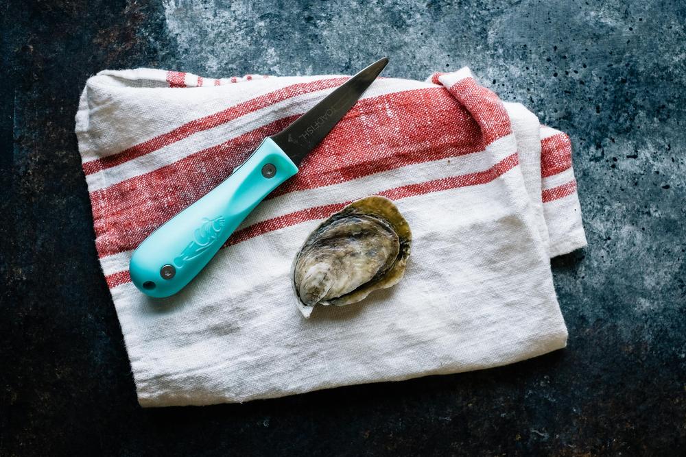 Put 'Em Back Oyster Shucker