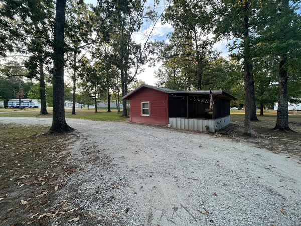 Circle driveway with boat and trailer parking near Sam Rayburn boat ramps