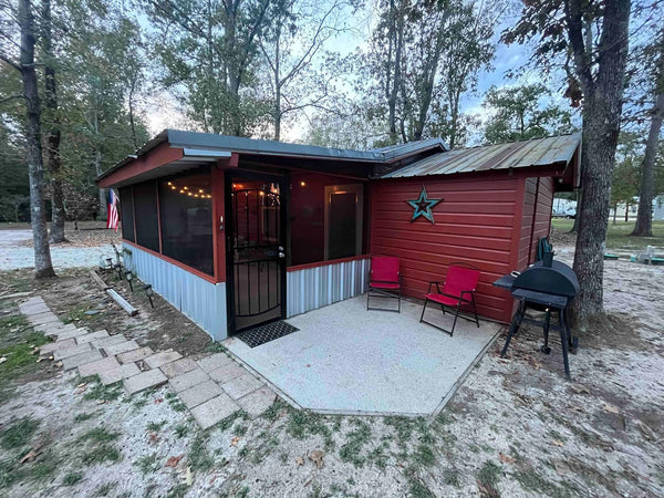 Cabin patio with charcoal grill for cooking the day's catch
