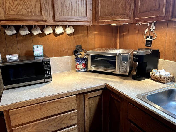 Coffee station with Keurig, microwave, and convection oven